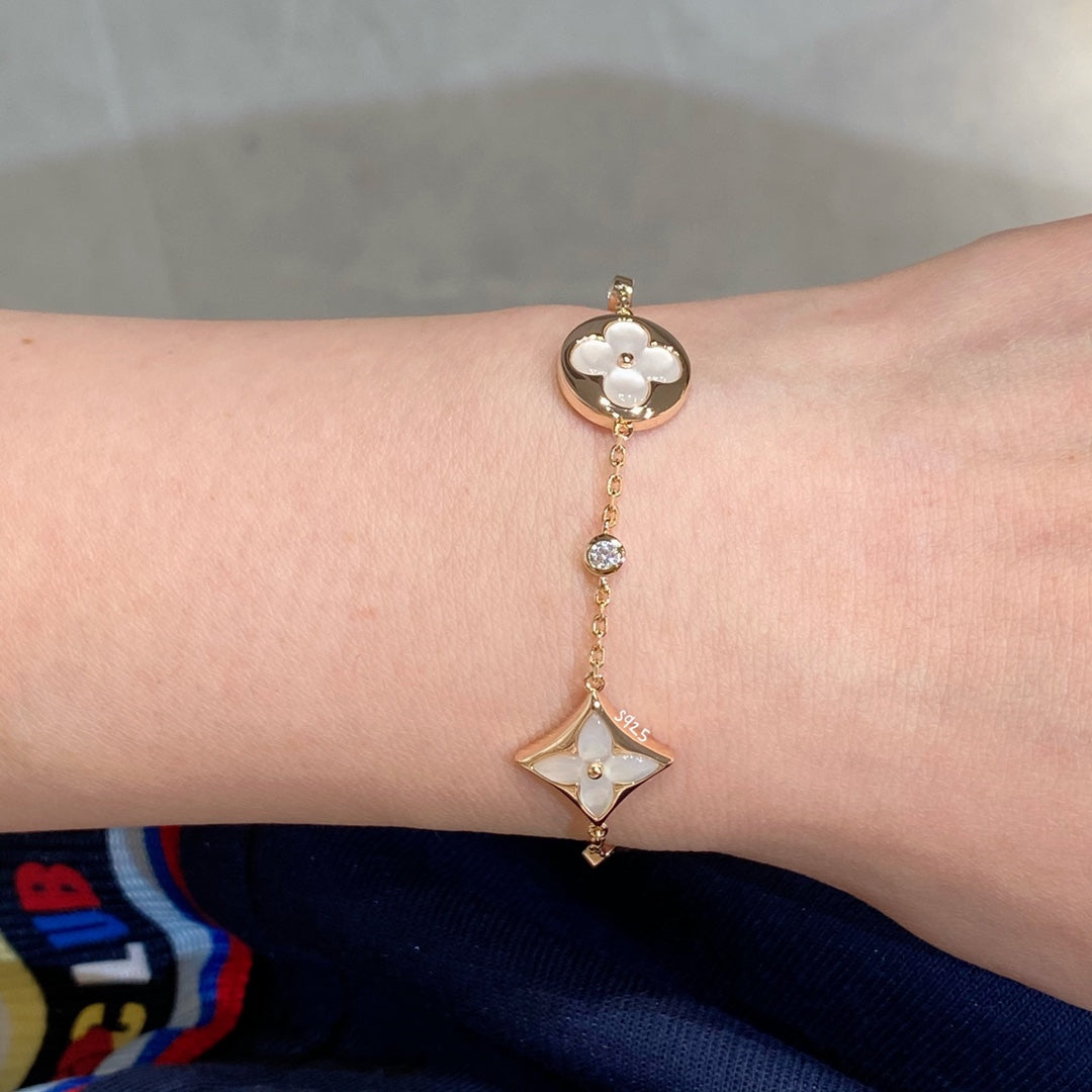 [moco jewelrys]STAR AND SUN 4 MOTIF WHITE MOP PINK GOLD BRACELET