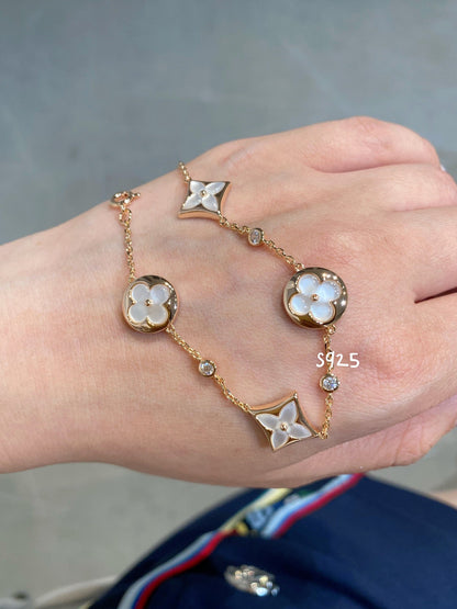 [moco jewelrys]STAR AND SUN 4 MOTIF WHITE MOP PINK GOLD BRACELET