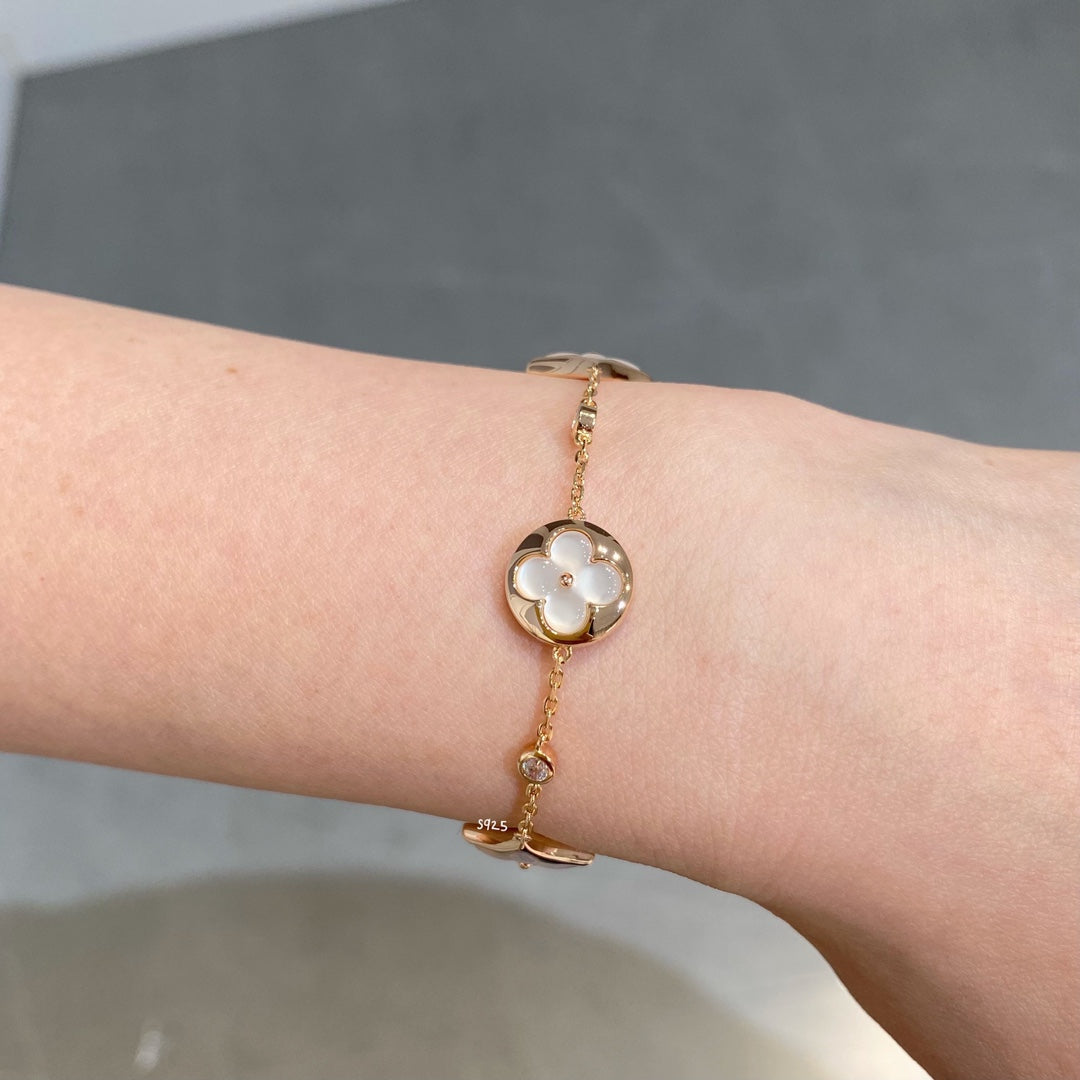 [moco jewelrys]STAR AND SUN 4 MOTIF WHITE MOP PINK GOLD BRACELET