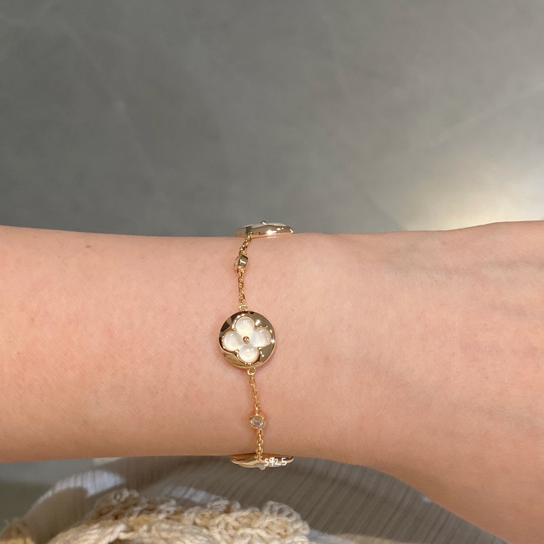 [moco jewelrys]STAR AND SUN 4 MOTIF WHITE MOP PINK GOLD BRACELET