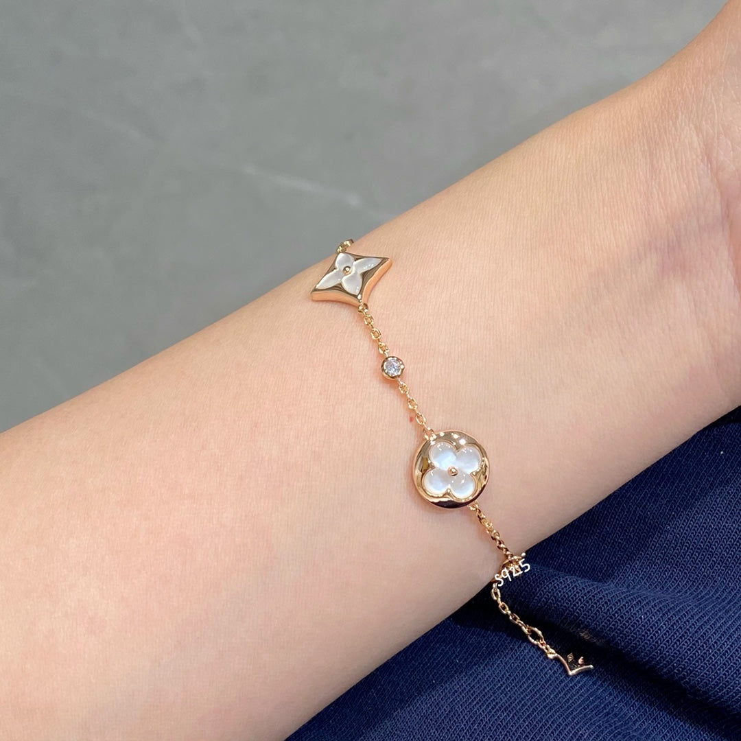 [moco jewelrys]STAR AND SUN 4 MOTIF WHITE MOP PINK GOLD BRACELET